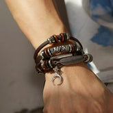 Hot Sale Men Feather Leather Bracelet Set Punk Hip-Hop Multi-layer HanSPECIFICATIONSBrand Name: rinhooGender: MenMaterial: LeatherMetals Type: Zinc alloyBracelets Type: Charm BraceletsOrigin: Mainland ChinaCN: ZhejiangChain Type: NONEIJewelry CirclesJewelry CirclesHot Sale Men Feather Leather Bracelet Set Punk Hip-Hop Multi-layer Handmade Braided Bracelets Adjustable Jewelry Accessories