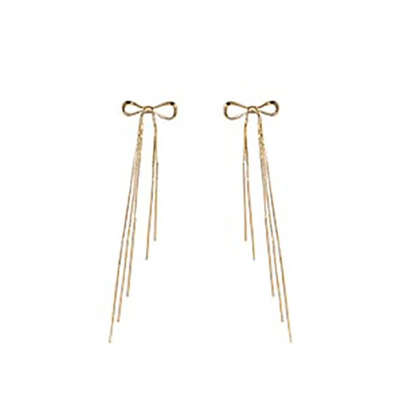 Classic Metal Bow Gold Colour Tassel Drop Earrings For Woman 2023 New SPECIFICATIONSBrand Name: TaoyaMaterial: MetalMetals Type: Copper AlloyOrigin: Mainland ChinaCN: ZhejiangItem Type: EarringsStyle: ClassicEarring Type: Drop EarringsJewelry CirclesJewelry CirclesClassic Metal Bow Gold Colour Tassel Drop Earrings