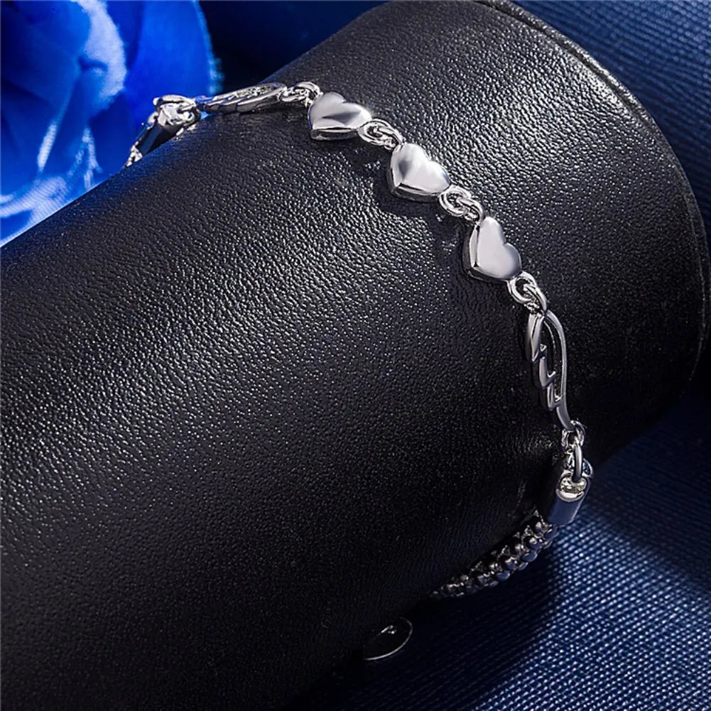 Hot sale 925 sterling silver romantic heart Love Bracelet for woman LuSPECIFICATIONSBrand Name: KCRLPBracelets Type: Chain &amp; Link BraceletsMain Stone: NONEOrigin: Mainland ChinaCertificate: noItem Weight: 8gMetals Type: silverMetalJewelry CirclesJewelry CirclesHot sale 925 sterling silver romantic heart Love Bracelet