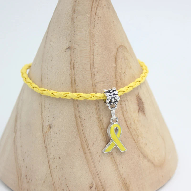 New Arrival  Breast Cancer Bracelet Yellow Pink Ribbon Charm BraceletsSPECIFICATIONSBrand Name: LIOBONARGender: WomenMaterial: MetalMetals Type: Zinc alloyBracelets Type: Charm BraceletsOrigin: Mainland ChinaCN: ZhejiangChain Type: PU Jewelry CirclesJewelry CirclesArrival Breast Cancer Bracelet Yellow Pink Ribbon Charm Bracelets Awareness Jewelry