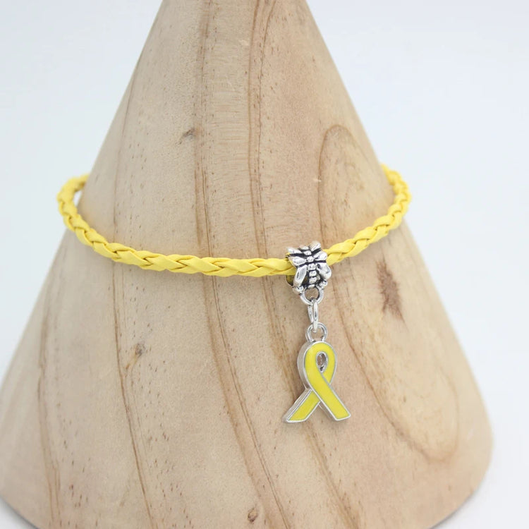 New Arrival  Breast Cancer Bracelet Yellow Pink Ribbon Charm BraceletsSPECIFICATIONSBrand Name: LIOBONARGender: WomenMaterial: MetalMetals Type: Zinc alloyBracelets Type: Charm BraceletsOrigin: Mainland ChinaCN: ZhejiangChain Type: PU Jewelry CirclesJewelry CirclesArrival Breast Cancer Bracelet Yellow Pink Ribbon Charm Bracelets Awareness Jewelry