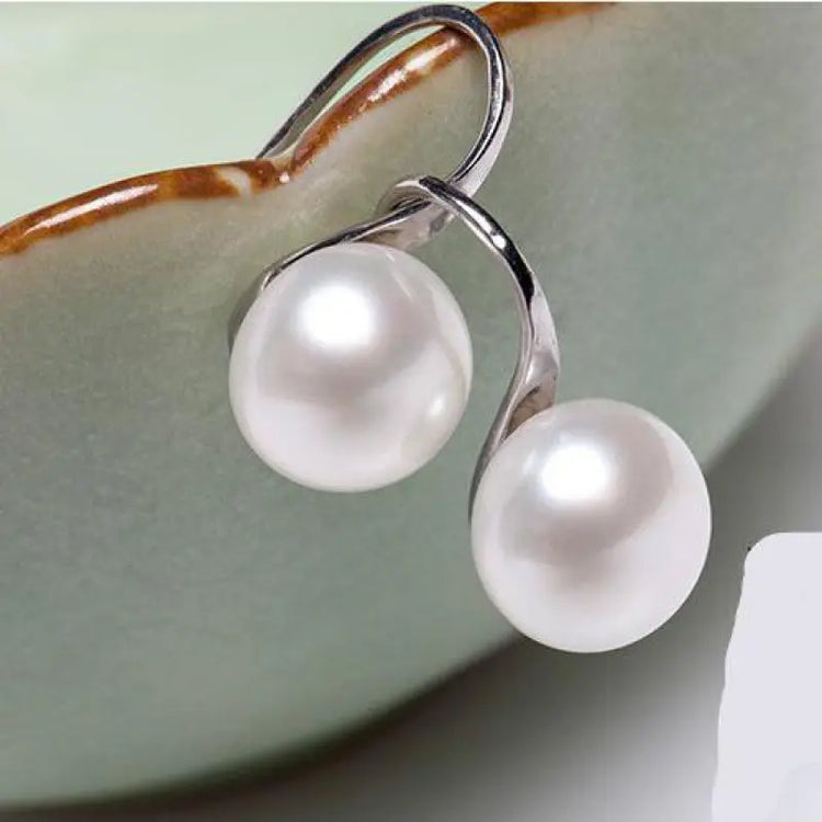 Glamour Earrings Sale Natural Freshwater Pearl Earrings Korean FashionSPECIFICATIONSBrand Name: ZHEGUOYAOLUMaterial: PEARLPearl Type: Simulated-pearlMetals Type: Zinc alloyOrigin: Mainland ChinaModel Number: Pearl ear-ringsItem Type: EJewelry CirclesJewelry CirclesGlamour Earrings Sale Natural Freshwater Pearl Earrings Korean Fashion 2019