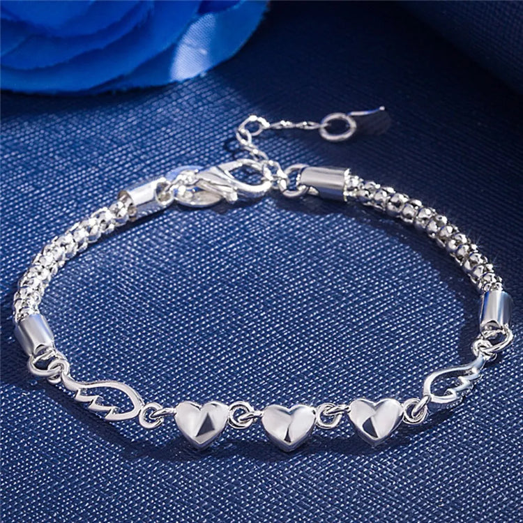 Hot sale 925 sterling silver romantic heart Love Bracelet for woman LuSPECIFICATIONSBrand Name: KCRLPBracelets Type: Chain &amp; Link BraceletsMain Stone: NONEOrigin: Mainland ChinaCertificate: noItem Weight: 8gMetals Type: silverMetalJewelry CirclesJewelry CirclesHot sale 925 sterling silver romantic heart Love Bracelet