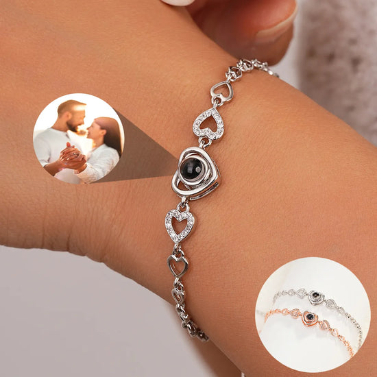 Wholesale Personalized Projection Photo Bracelet-Heart Pendant BraceleSPECIFICATIONSBrand Name: DHQHCustomized Type: PhotoGender: UnisexMetals Type: CopperBracelets Type: Charm BraceletsMaterial: MetalOrigin: Mainland ChinaCN: ZhejiangJewelry CirclesJewelry CirclesWholesale Personalized Projection Photo Bracelet-Heart Pendant Bracelet-Projection -Memorial Photo Bracelet-Photo Jewelry