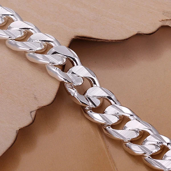 high quality fashion hot sale 925 Silver Bracelets charm 10MM chain MeSPECIFICATIONSBrand Name: CHSHINEBracelets Type: Chain &amp; Link BraceletsMain Stone: NONEOrigin: Mainland ChinaCertificate: YESItem Weight: 11Metals Type: silverMeJewelry CirclesJewelry Circleshigh quality fashion hot sale 925 Silver Bracelets charm 10MM chain Men Women wedding gift free shipping factory price