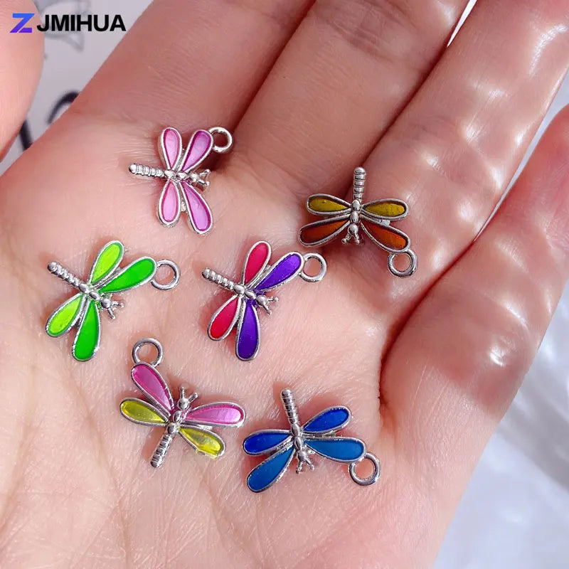 15PCS Enamel Colorful Dragonfly Charms Pendant Supplies For DIY HandmaSPECIFICATIONSBrand Name: ZJMIHUAOrigin: Mainland ChinaMetals Type: Zinc alloyCharms Type: AnimalsFine or Fashion: FashionModel Number: Charms DYD250Material: MetalSJewelry CirclesJewelry CirclesDIY Handmade Earrings Bracelets Jewelry Making Findings Accessories