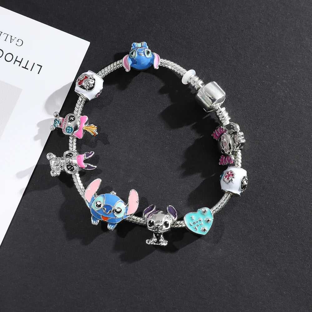 Disney Stitch Charm Bracelet Cartoon Lilo & Stitch Inspired Bracelet DSPECIFICATIONSBrand Name: DisneyGender: WomenMaterial: MetalMetals Type: Zinc alloyBracelets Type: Charm BraceletsOrigin: Mainland ChinaCN: ZhejiangChain Type: SnakeJewelry CirclesJewelry CirclesDisney Stitch Charm Bracelet Cartoon Lilo & Stitch Inspired Bracelet DIY Stitch Pendant Beads Bangle